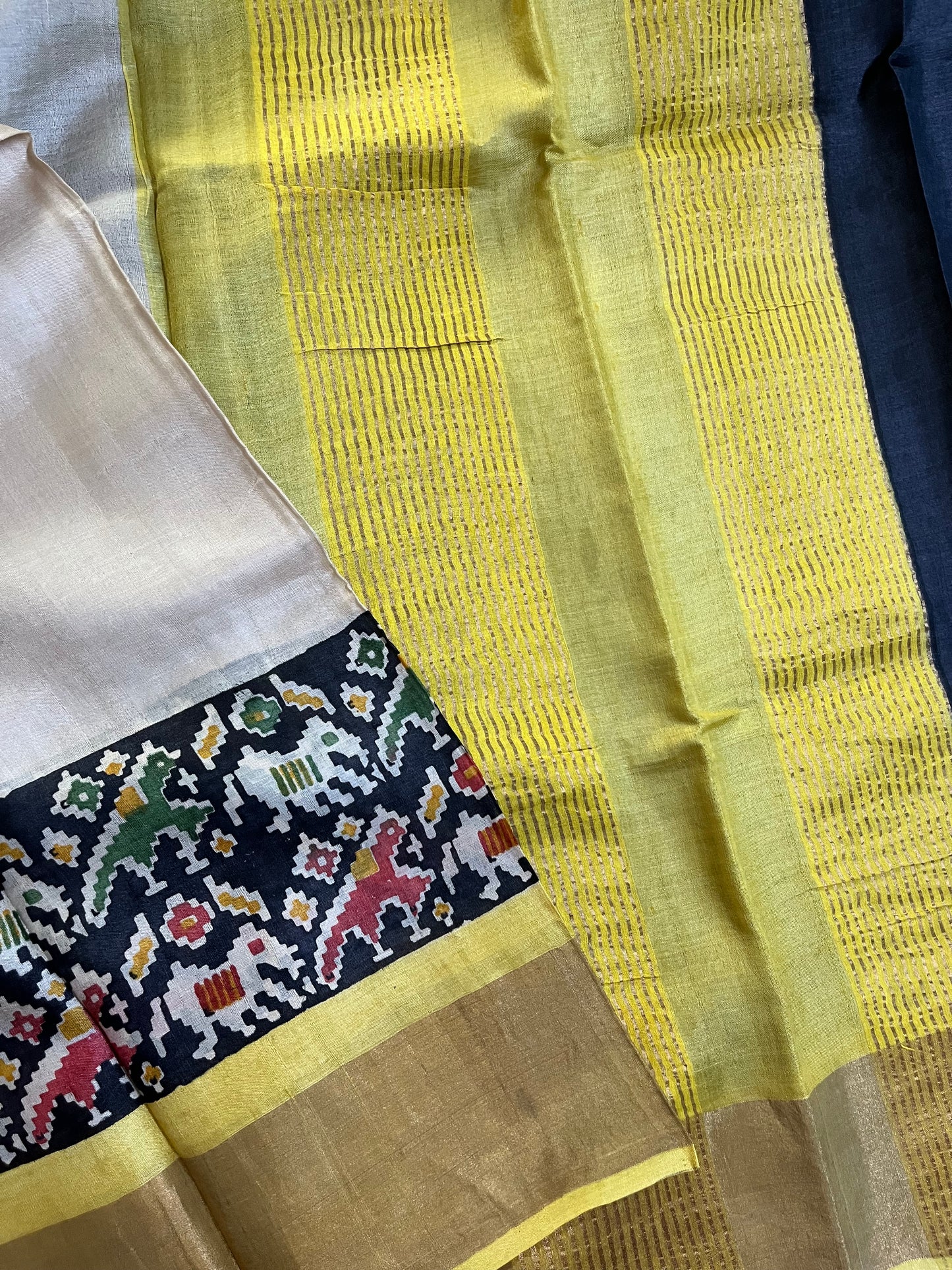 Cream Tussar Silk Saree with Patola Zari Border