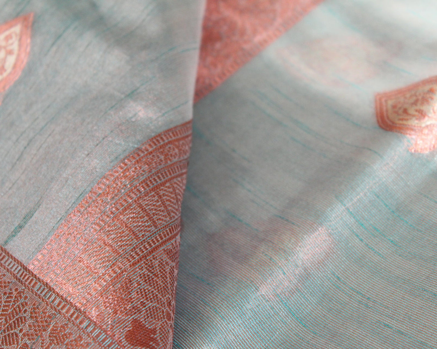 Mint Green Tissue Organza Saree with Copper Motifs